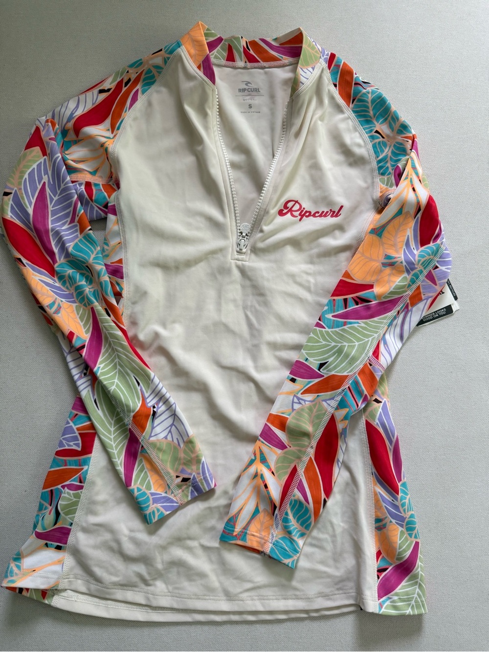 NWT Rip Curl Rash Guard with Colorful Tropical Print Sleeves